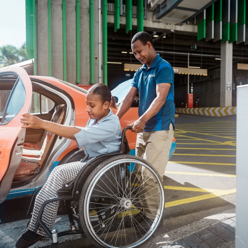 Even though she has a regular taxi driver, Kerry Kawowo often has to rely on standard transportation, which can be challenging for people with disabilities. Credit: GPE/Esteban Barrera